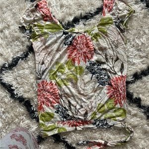 It is a Charlotte Russe floral short sleeve top in a size large